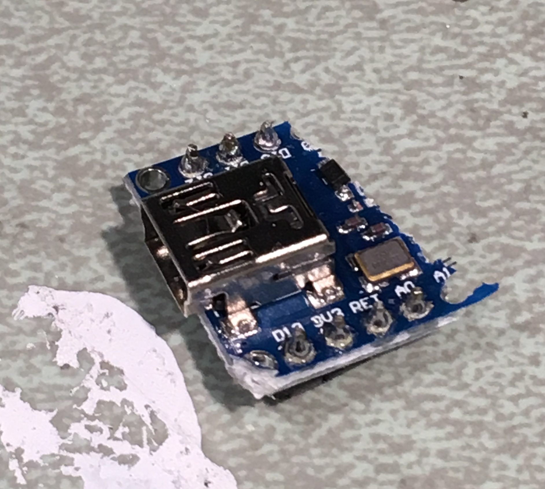 This is the head of a beheaded Arduino Nano. We soldered an arduino nano onto the second iteration of the main circuit box and ended up having to destroy it because it stopped working. Then, for the second iteration.