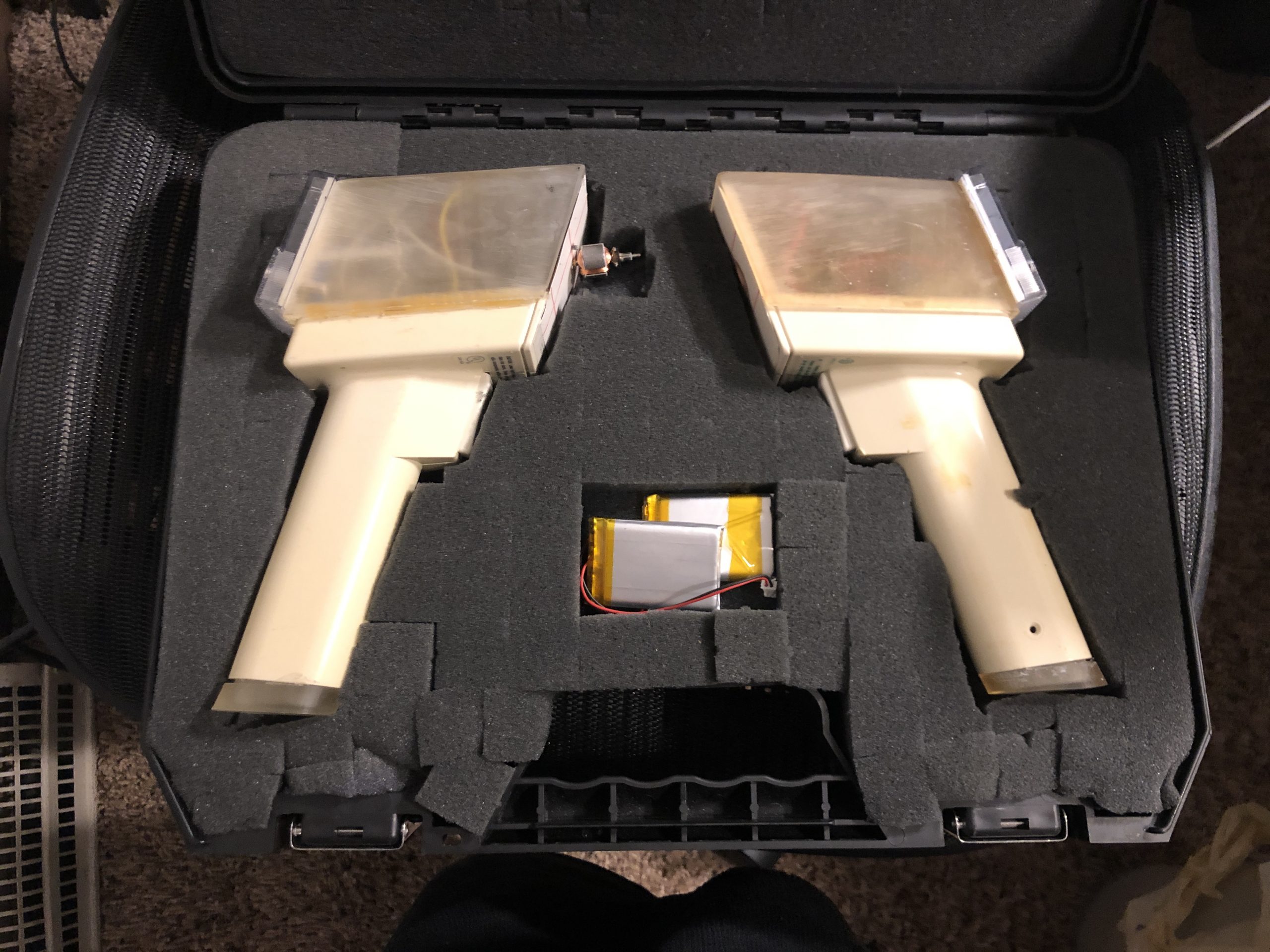 The two prototype Meiger counters in their carrying case, with the batteries removed and stored in a separate compartmenta